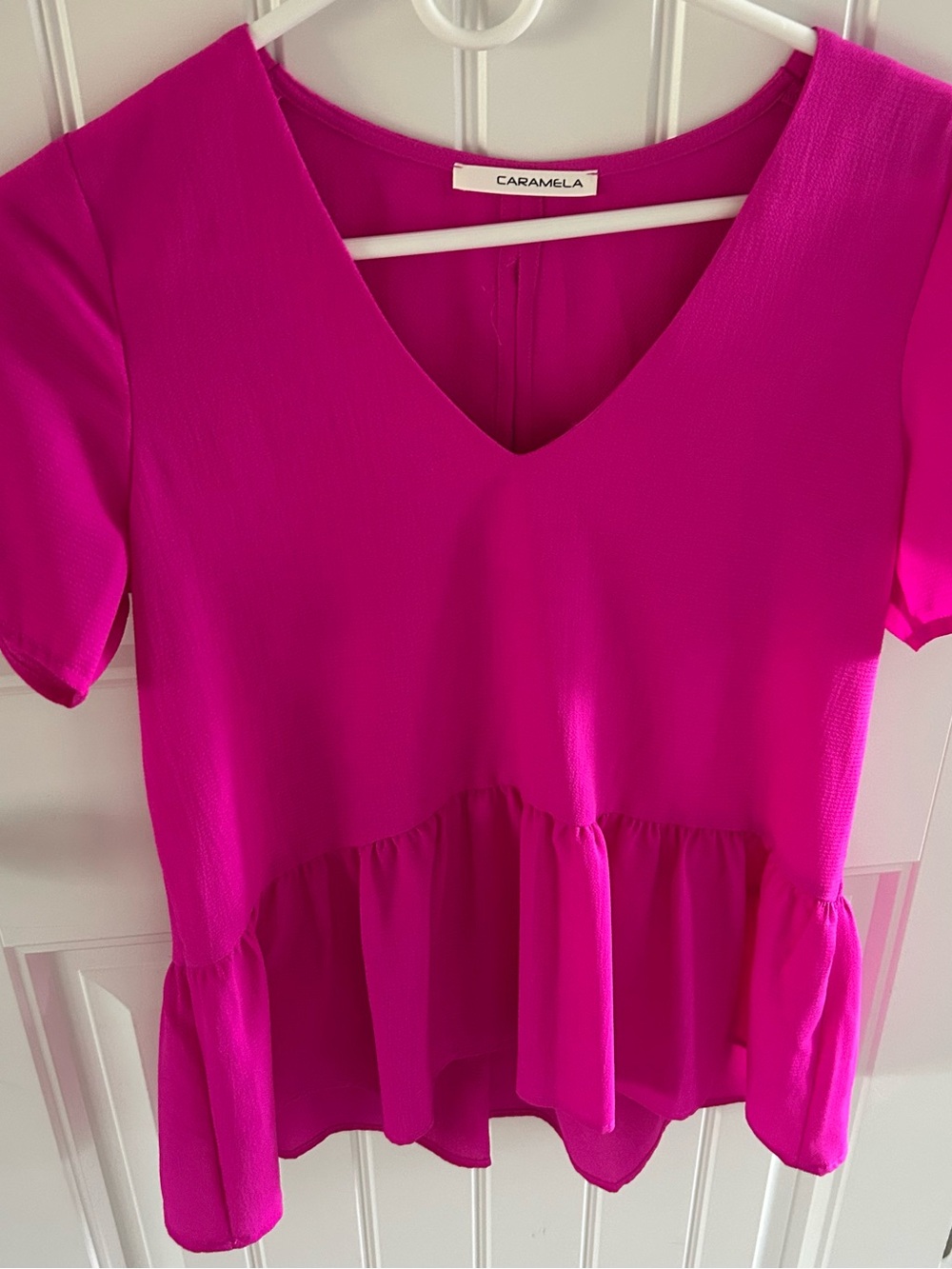Caramela V-Neck Peplum Blouse in Fuchsia Pink